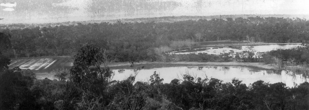 Panorama taken in 1921 from One-Tree (Reabold) Hill over West Lake (foreground) and East Lake (middle distance on the right).  The photo was taken during one of the wettest periods on record.  Dead mature trees around both lakes suggest a recent rise in water levels.  Formal water level monitoring at Perry Lakes (West Lake) commenced in 1963.  Copyright holder unknown, reproduced by permission Town of Cambridge.